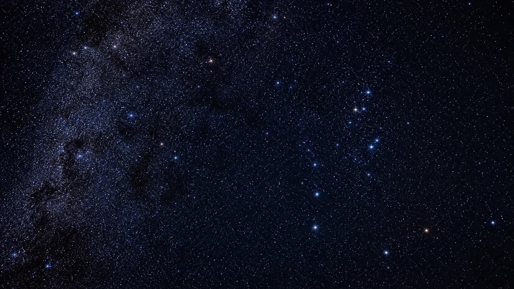 A dense field of stars with faint constellation outlines